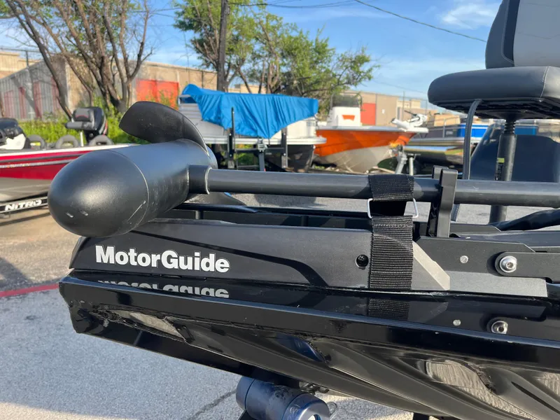 Slide: The Image of 2022 Lowe Legacy boat on trailer, viewed from below, showcasing hull design. - 24