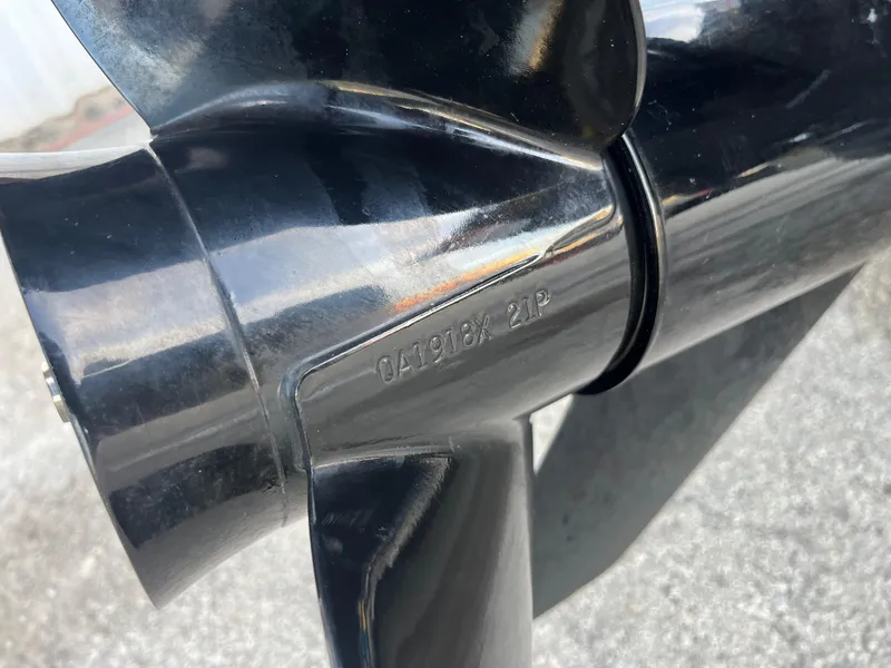 Slide: The Image of Close-up of a shiny black boat propeller, Lowe Legacy 2022 model. - 32