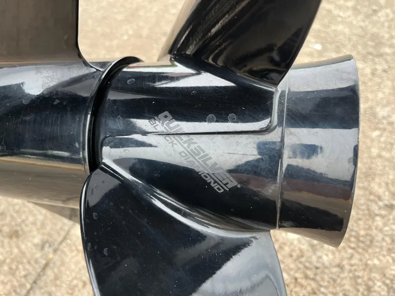 Slide: The Image of 2022 Lowe Legacy boat hull on trailer, showcasing sleek design and durable construction. - 37