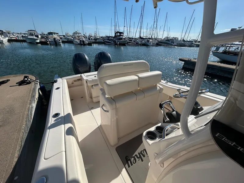 Slide: The Image of 2020 Grady-White Fisherman 257 boat docked at marina with dual engines. - 8