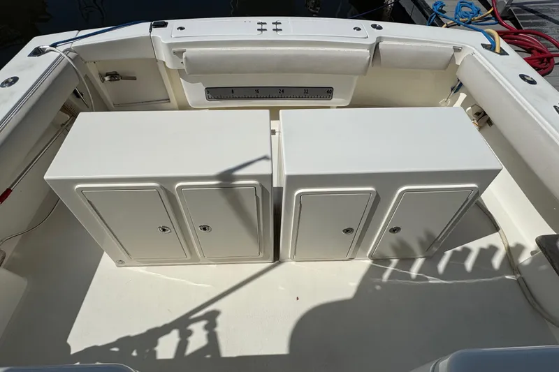 Slide: The Image of 2007 Albemarle 410 Express Fisherman boat deck with storage compartments. - 13