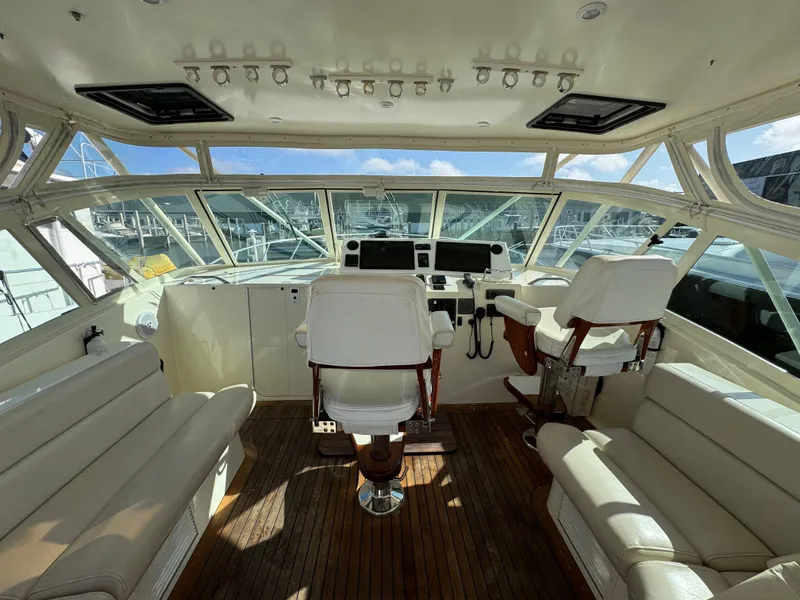 Slide: The Image of 2007 Albemarle 410 Express Fisherman helm with leather seating and panoramic windows. - 29
