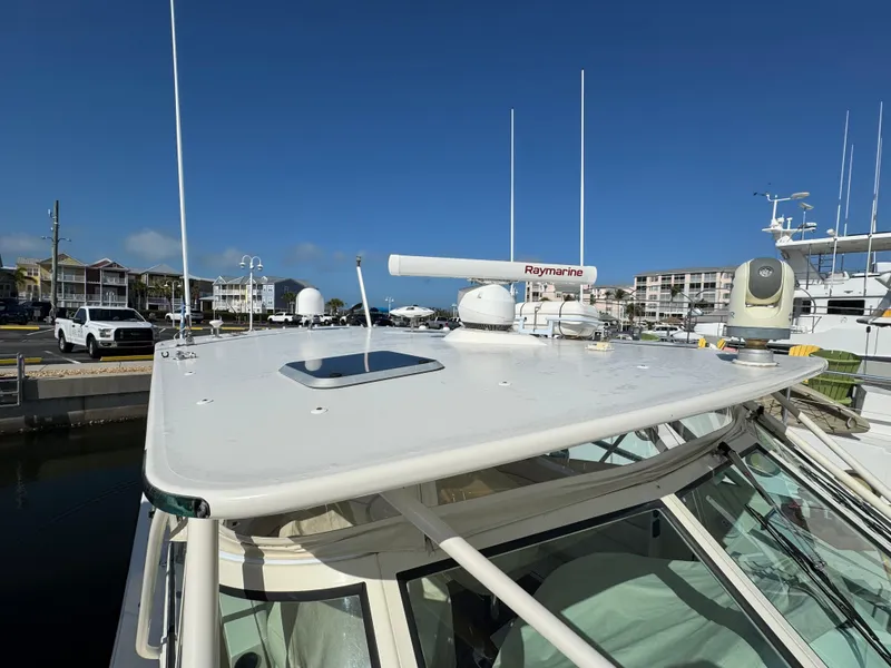 Slide: The Image of 2007 Albemarle 410 Express Fisherman boat with Raymarine radar at marina. - 5