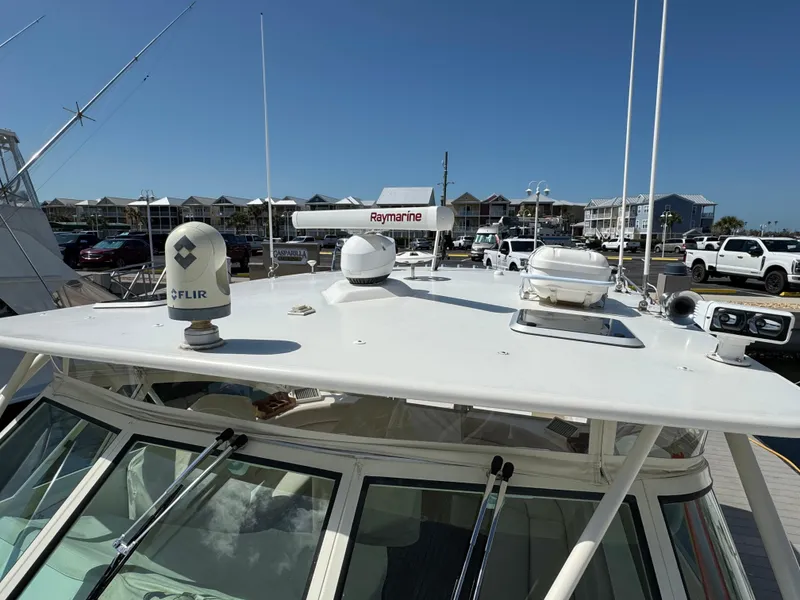 Slide: The Image of 2007 Albemarle 410 Express Fisherman boat with radar and navigation equipment on deck. - 8