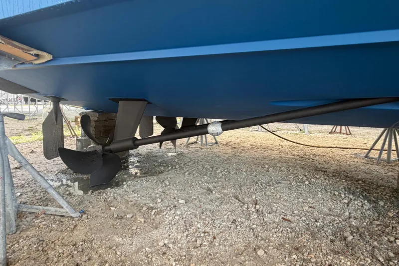Slide: The Image of Underneath view of a 2007 Albemarle 41 Express boat showing propeller and hull. - 82