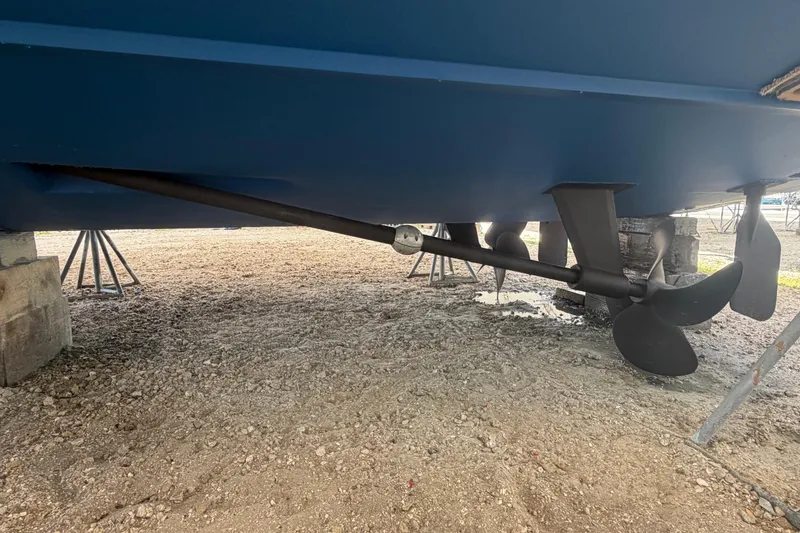 Slide: The Image of Underwater view of 2007 Albemarle 41 Express boat propeller and shaft on dry land. - 90