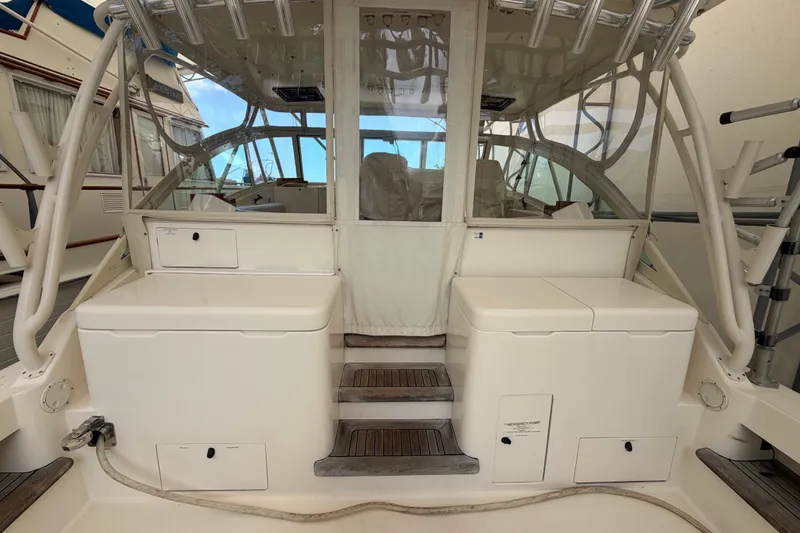 Slide: The Image of 2007 Albemarle 41 Express boat interior with seating and storage compartments. - 16