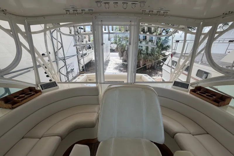 Slide: The Image of Interior view of 2007 Albemarle 41 Express yacht cockpit with seating and windows. - 30