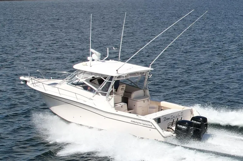 Slide: The Image of 2007 Grady-White Express 330 boat cruising on open water. - 0