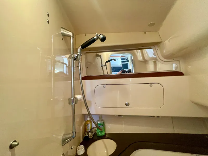 Slide: The Image of 2007 Grady-White Express 330 boat bathroom with shower and sink. - 20