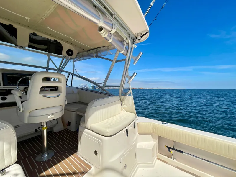 Slide: The Image of 2007 Grady-White Express 330 boat interior with ocean view and clear blue sky. - 29
