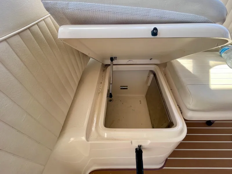 Slide: The Image of Open storage compartment on 2007 Grady-White Express 330 boat interior. - 33