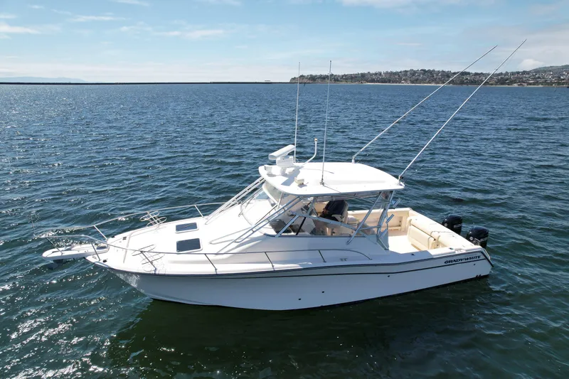 Slide: The Image of 2007 Grady-White Express 330 boat on open water, side view. - 5