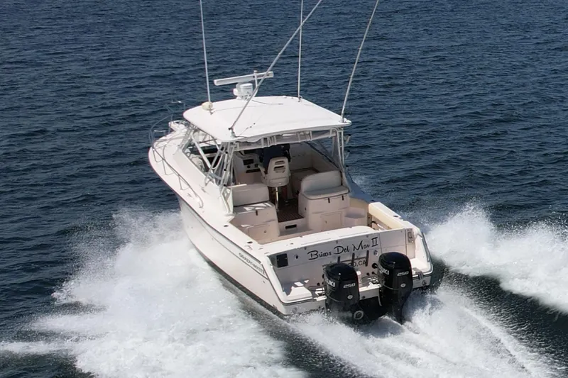 Slide: The Image of 2007 Grady-White Express 330 boat cruising on open water. - 9