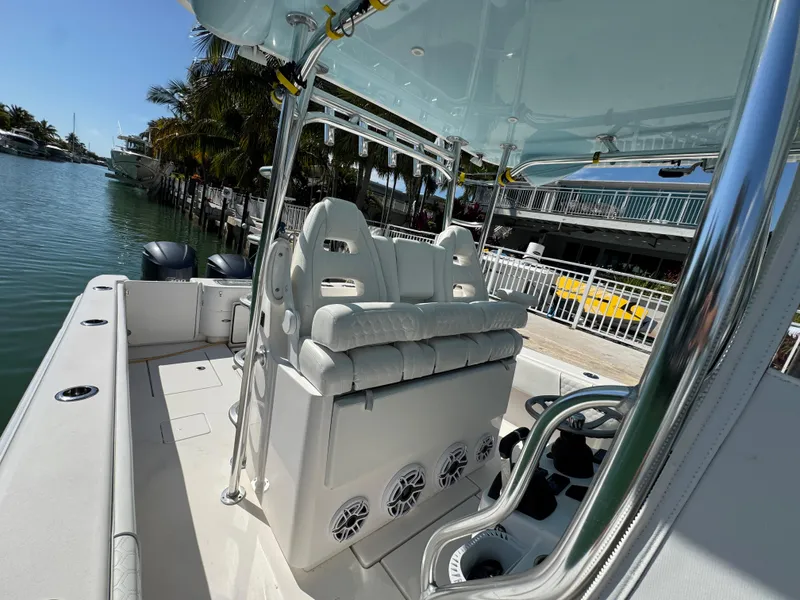 Slide: The Image of 2021 Contender 39 Fisharound boat interior with seating and water view. - 19