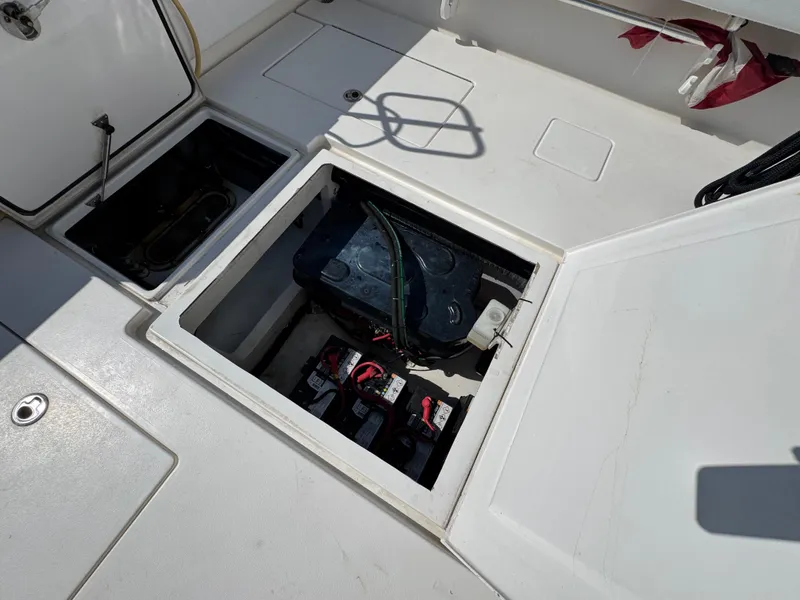 Slide: The Image of 2021 Contender 39 Fisharound boat battery compartment with open hatch. - 20