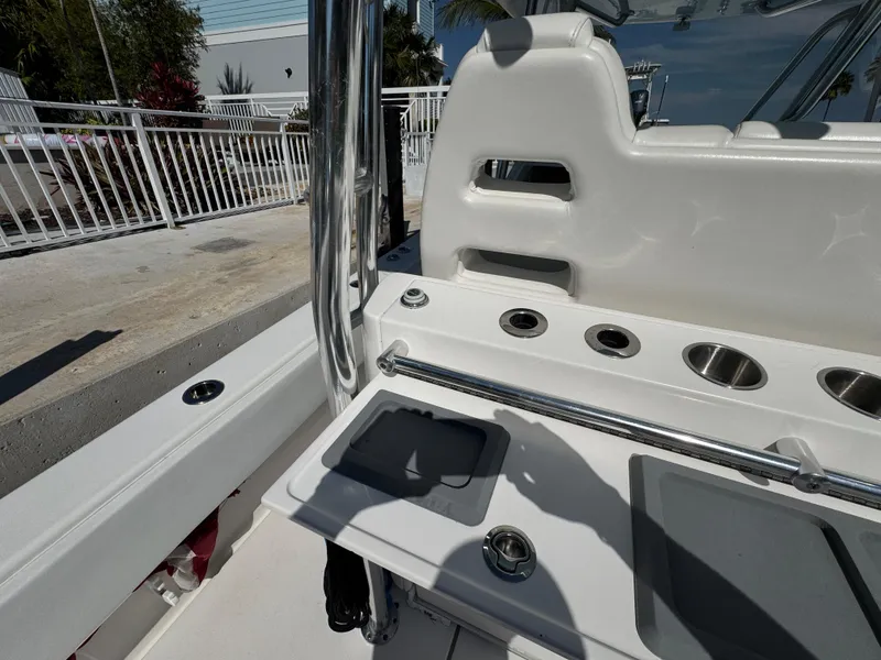 Slide: The Image of 2021 Contender 39 Fisharound boat deck with rod holders and storage compartments. - 25