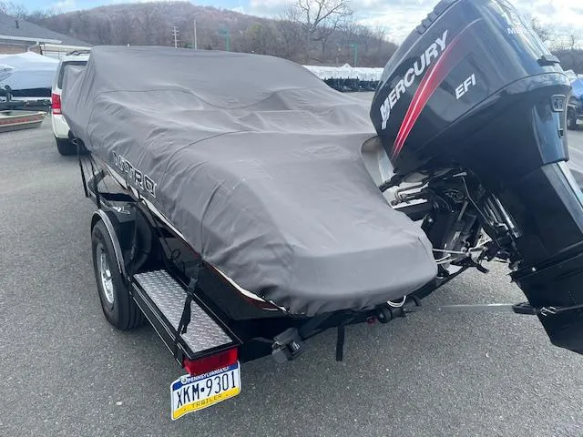 Slide: The Image of Covered 2009 Nitro 189 Sport boat with Mercury engine on trailer. - 14