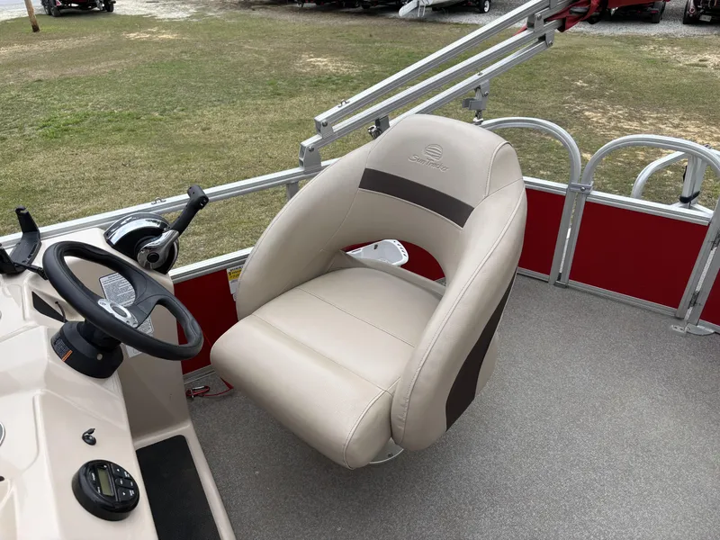 Slide: The Image of 2017 Sun Tracker Party Barge 18 DLX captain's chair and steering console. - 12