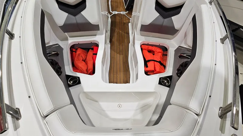 Slide: The Image of 2016 Monterey 258 Super Sport boat interior with life jackets and seating. - 19