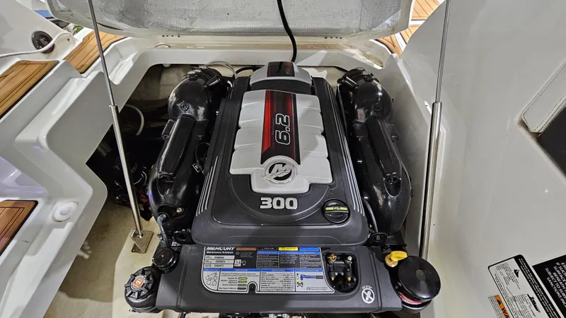 Slide: The Image of 2016 Monterey 258 Super Sport engine compartment with 6.2L 300 HP engine. - 33