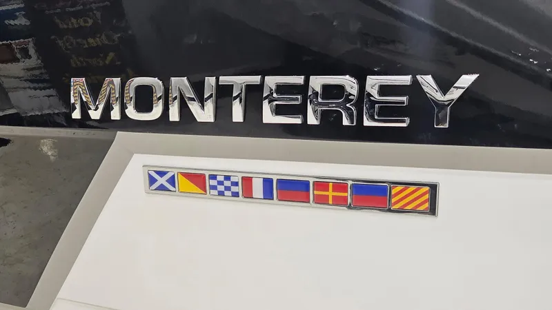 Slide: The Image of 2016 Monterey 258 Super Sport logo with nautical flags on display. - 38
