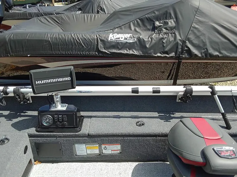 Slide: The Image of 2022 Ranger VS1665T boat interior with Humminbird fish finder and covered seats. - 12