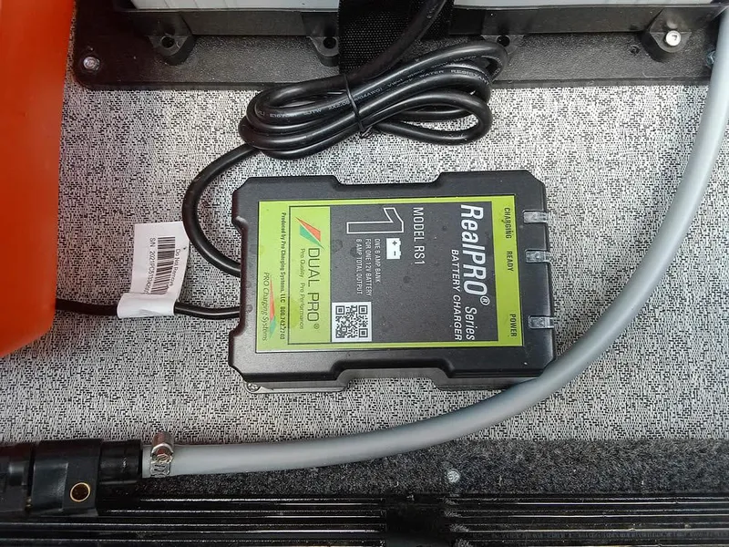 Slide: The Image of Battery charger in 2022 Ranger VS1665T boat, featuring RealPRO Series by Dual Pro. - 18