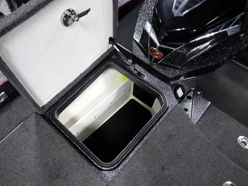 Slide: The Image of 2019 Ranger Z520L Comanche DC boat storage compartment with open lid. - 16