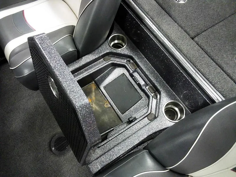 Slide: The Image of 2019 Ranger Z520L Comanche DC boat storage compartment with cup holders and seating. - 24