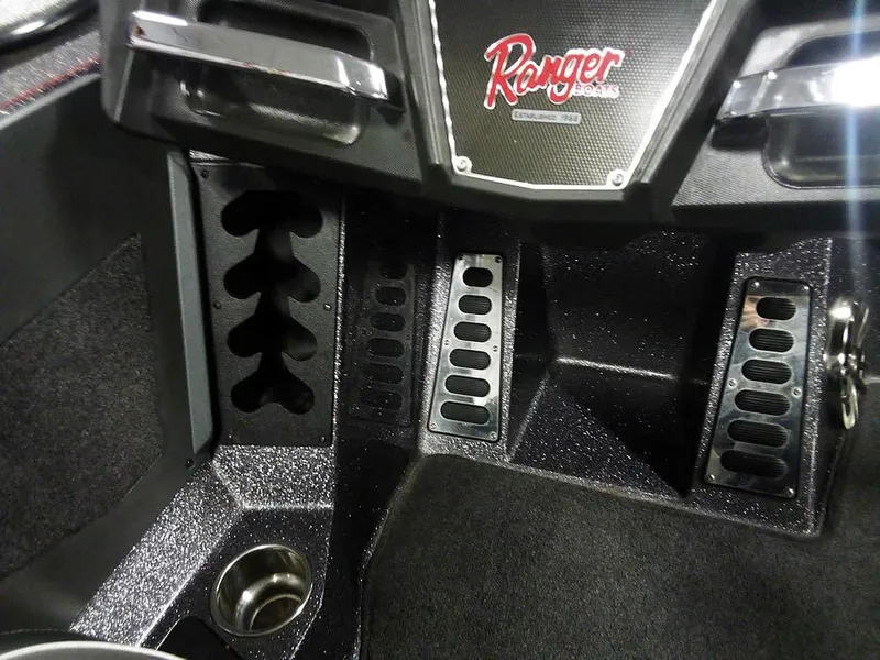 Slide: The Image of 2019 Ranger Z520L Comanche DC boat interior with sleek design and storage compartments. - 28