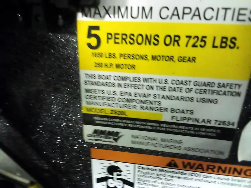 Slide: The Image of 2019 Ranger Z520L Comanche DC capacity label, 5 persons or 725 lbs, safety compliance details. - 29