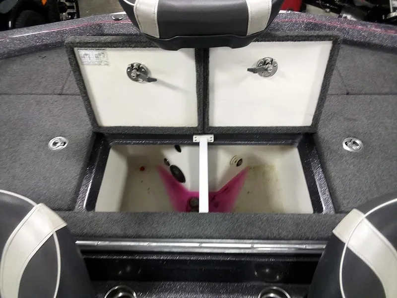 Slide: The Image of 2019 Ranger Z520L Comanche DC boat storage compartments with open lids and seating. - 37