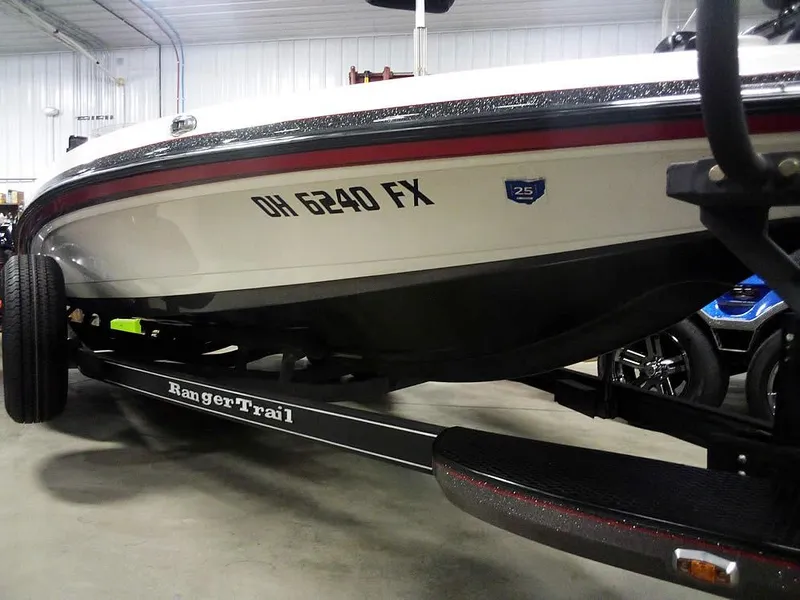 Slide: The Image of 2019 Ranger Z520L Comanche DC boat on trailer in indoor storage. - 4