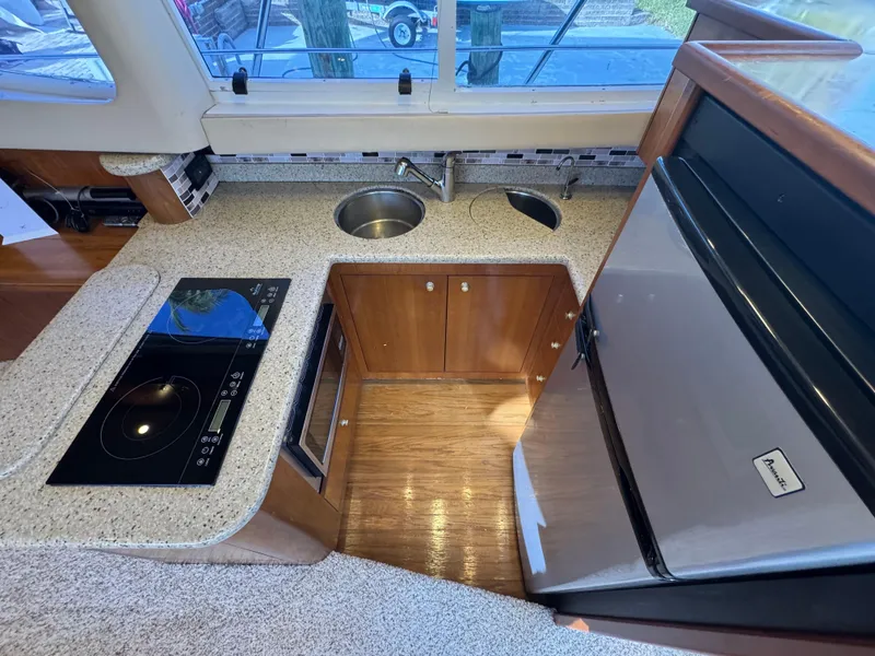 Slide: The Image of 27 2003 Cruisers Yacht 4450 Galley Port.jpg - 26