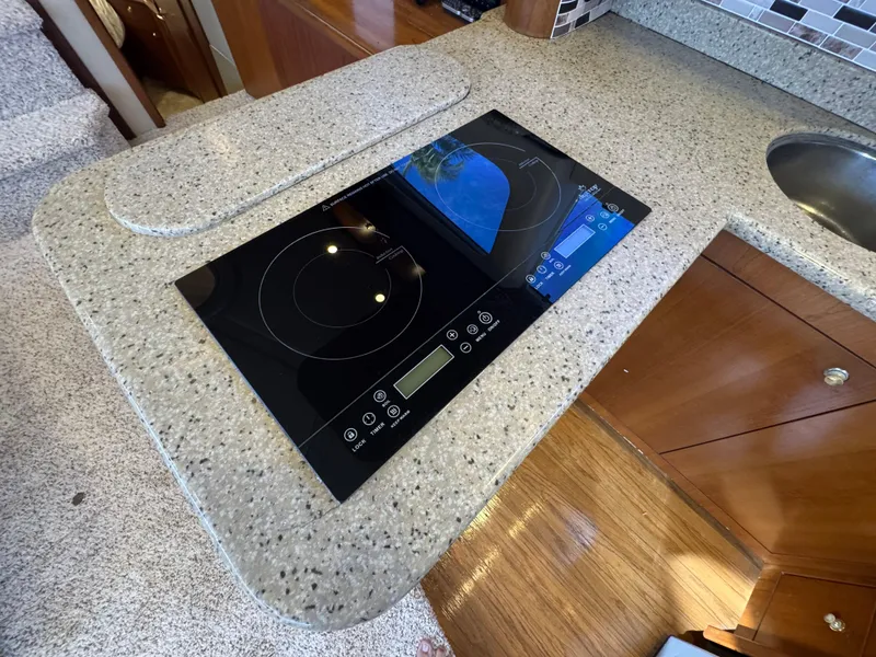 Slide: The Image of 29 2003 Cruisers Yacht 4450 Galley Stovetop.jpg - 28