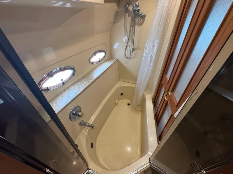Slide: The Image of 40 2003 Cruisers Yacht 4450 Aft Head with Jacuzzi Tub.jpg - 37