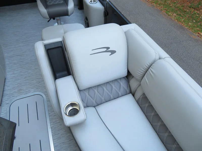 Slide: The Image of Luxurious seating on 2020 Bennington 25QXSBWAIO boat with cup holder and stylish upholstery. - 17