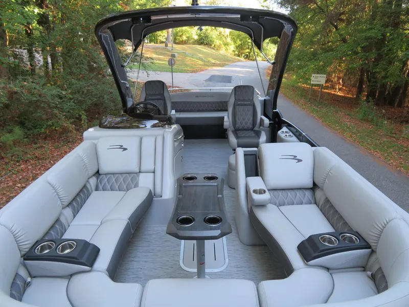 Slide: The Image of 2020 Bennington 25QXSBWAIO pontoon boat with luxurious seating and sleek design. - 22