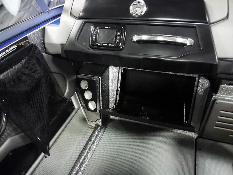 Slide: The Image of 2018 Ranger 621FS Fisherman boat dashboard with storage and control panel. - 16