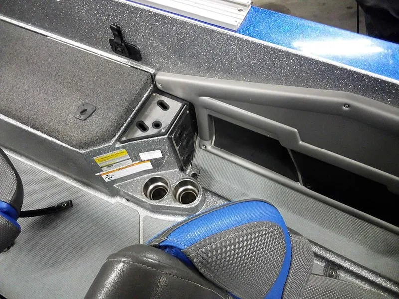 Slide: The Image of 2018 Ranger 621FS Fisherman boat interior with seating and storage compartments. - 19