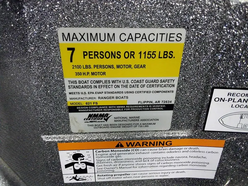 Slide: The Image of 2018 Ranger 621FS Fisherman capacity label, 7 persons or 1155 lbs, safety warnings included. - 20