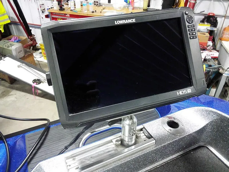 Slide: The Image of Lowrance HDS display on 2018 Ranger 621FS Fisherman boat, in a workshop setting. - 35