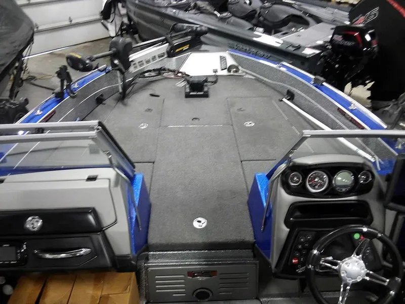 Slide: The Image of 2018 Ranger 621FS Fisherman boat interior with steering wheel and control panel. - 6