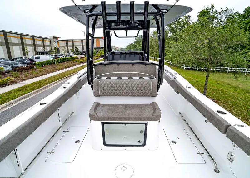Slide: The Image of 2025 Sea Hunt Gamefish 30 CB boat interior with seating and storage compartments. - 13