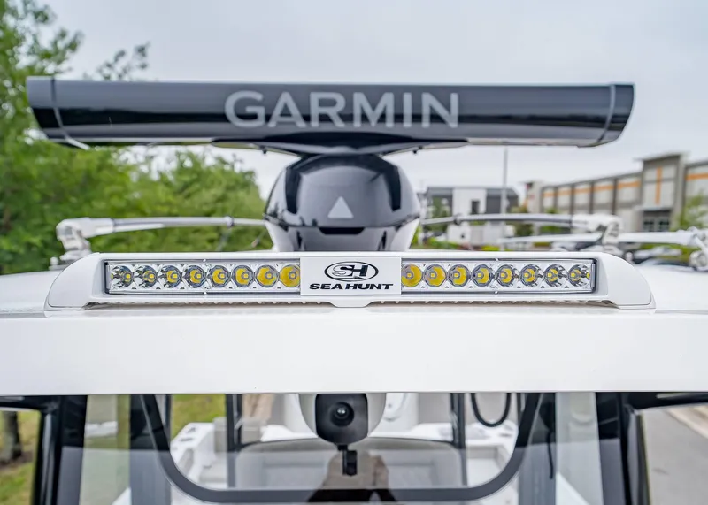 Slide: The Image of 2025 Sea Hunt Gamefish 30 CB boat with Garmin radar and LED lights. - 19