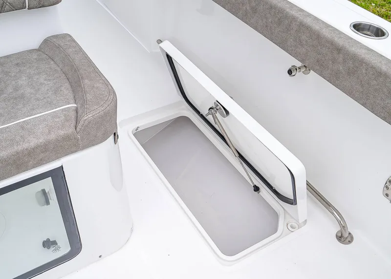 Slide: The Image of Open storage compartment on 2025 Sea Hunt Gamefish 30 CB boat. - 21