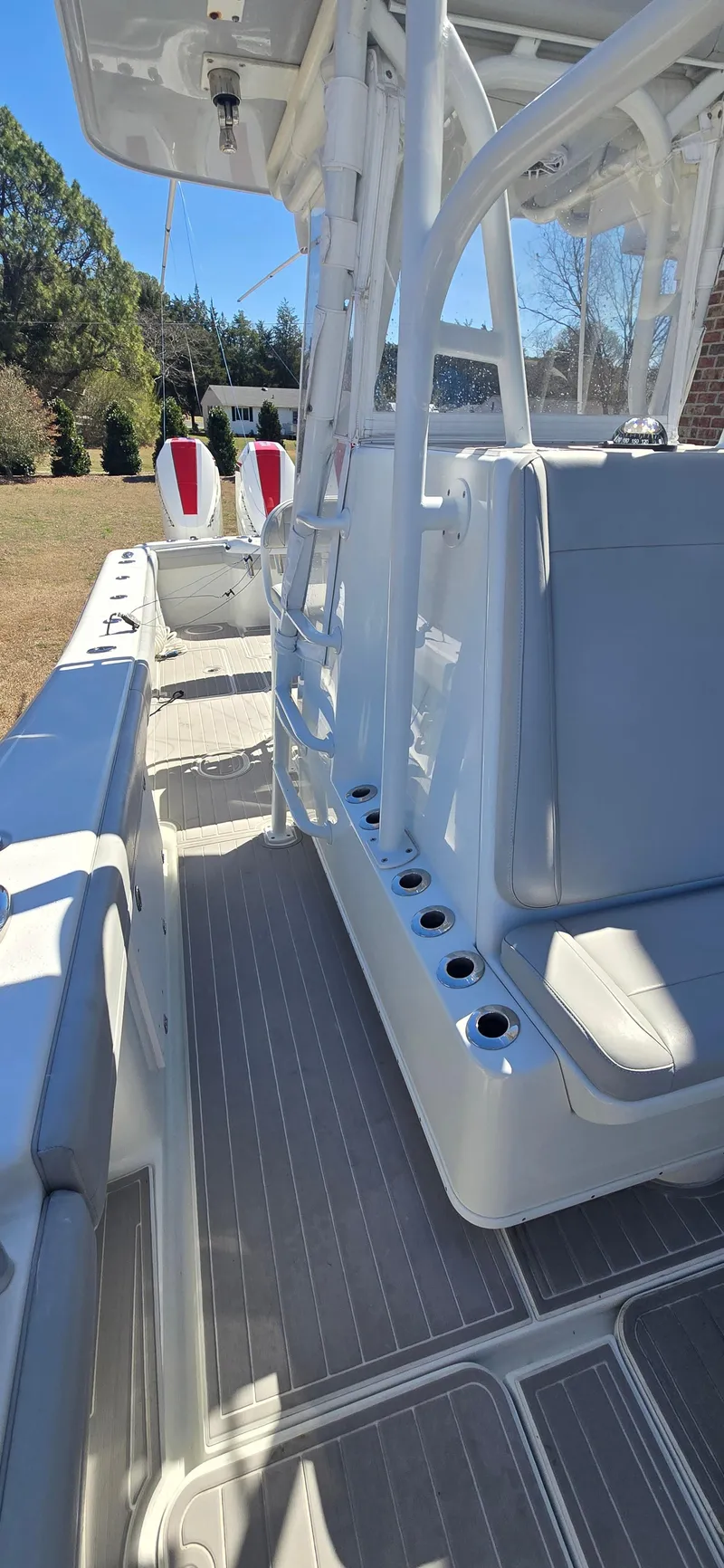 Slide: The Image of 2017 Yellowfin 36 boat interior with seating and rod holders. - 15