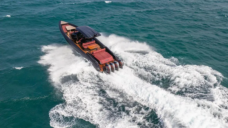 Slide: The Image of 2023 Skipper-BSK 42 boat cruising on open sea with powerful engines. - 0