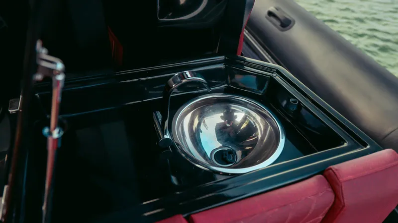 Slide: The Image of Stainless steel sink on Skipper-BSK 42 boat, 2023 model, with red leather accents. - 18